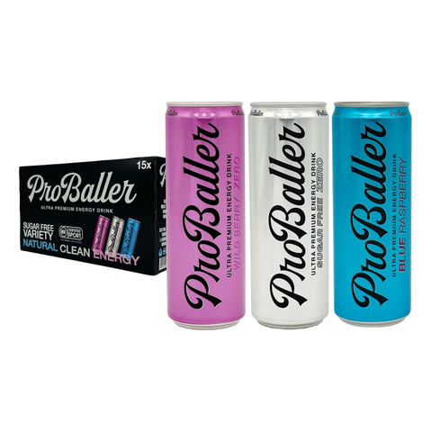 Three ProBaller energy drink cans in pink, white, and blue with a box in the background.